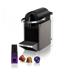 Machine á café Nespresso...